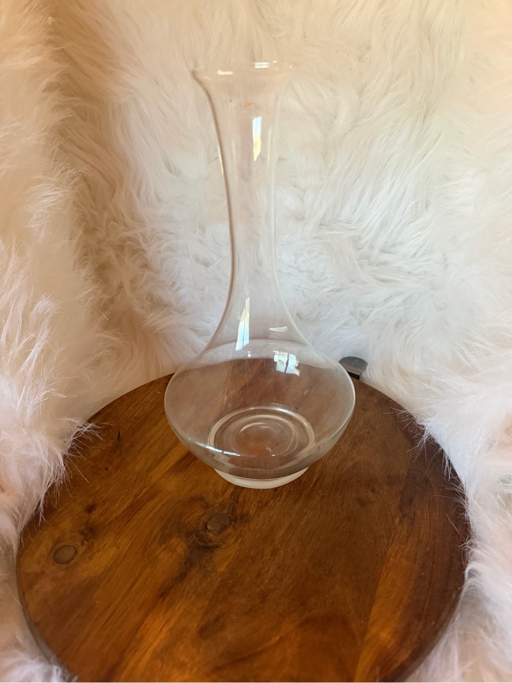 A clear, hand-blown Holmegaard glass decanter with a flared lip.